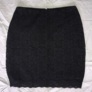 EXPRESS black stretchy lace pencil skirt. Size 4.